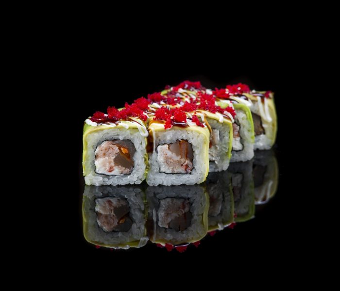 Sushi Roll On A Black Background . Japanese food. Close Up. High quality photo